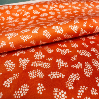 Tissu satin de coton, Collection Ricolette - Grumeaux - fond corail clair marbré